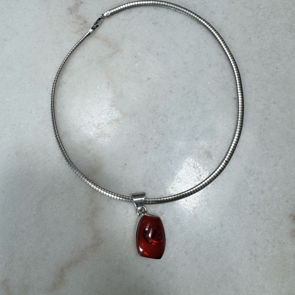 Elegant Silver Necklace with Red Pendant